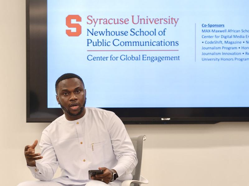 David speaking at Syracuse University’s Newhouse School.